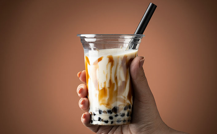 Biodegradable drinking straws with green leaves